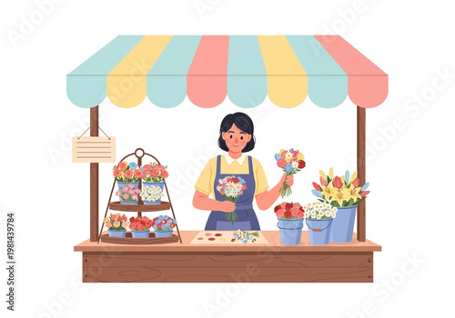 Woman selling flowers at market stall.