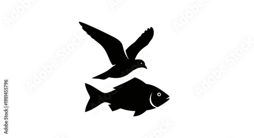 Bird flying over a fish swimming.