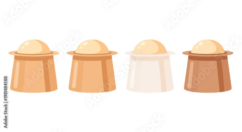 Four Different Shades of Foundation Makeup Swatches on White Background