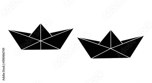 Two Black Paper Boats Floating Side by Side on White Background