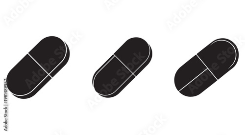 Three black and white capsules or pills with rounded edges and a line down the middle on a white background  medicine or healthcare concept