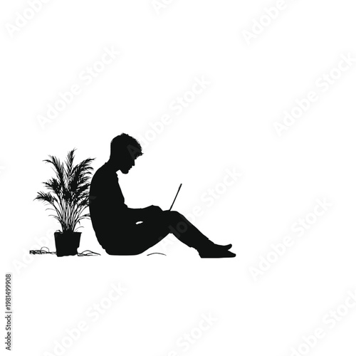 Man silhouette sitting on the floor while working on a laptop computer next to a potted palm plant in a minimalist setting to illustrate modern remote work and digital connectivity.