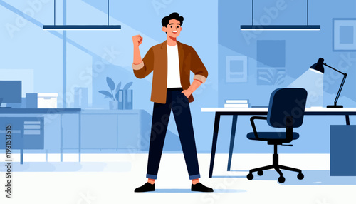 Young man stands confidently in modern office space. He smiles broadly, showing excitement or success. Fists clenched, he appears proud or triumphant