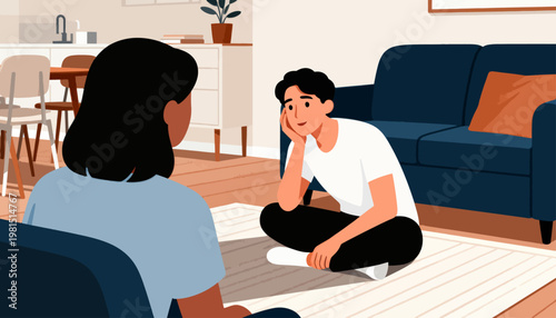 Two people sit on a rug in a cozy living room. One person rests a hand on their cheek, smiling warmly. The other faces them, listening attentively