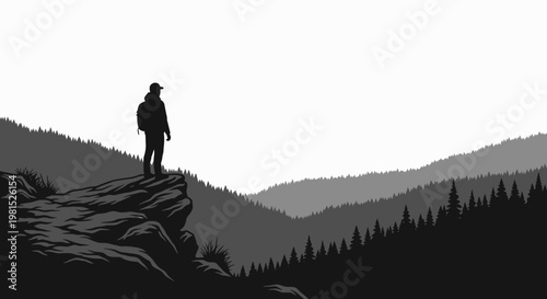 Silhouette of a person with a backpack standing on a cliff overlooking a forest landscape