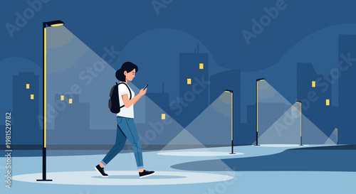 Woman walking at night in a city, illuminated by streetlights, looking at her phone