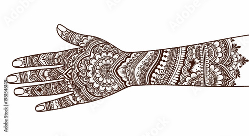 A woman's hand with intricate henna designs drawn on her palm and arm by an artist for a traditional Indian alevidhanu ceremony