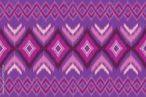 Ikat pattern in purple and pink tones featuring symmetrical repeating diamond shapes and zigzag lines. 
