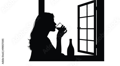 Silhouette of a woman drinking wine by a window