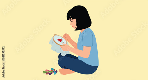 Young girl sitting cross-legged, focused on embroidering a red heart on fabric