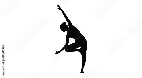 Woman performing a yoga pose gracefully bending in a dynamic black silhouette