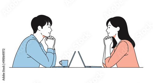 Professional man and woman engaged in focused discussion, each with a laptop, suggesting a business meeting or collaborative work.
