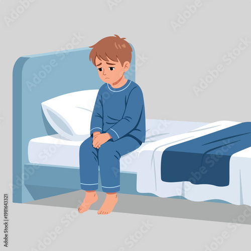 A sad young boy in pajamas sits alone on the edge of his bed in a bedroom scene