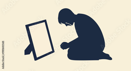 A silhouette of a person kneeling and praying before a blank picture frame stand