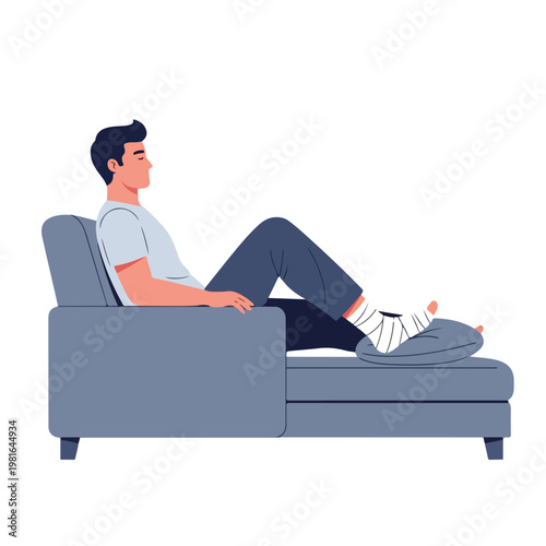 A man sitting on a sofa with his injured foot wrapped in a bandage on a pillow