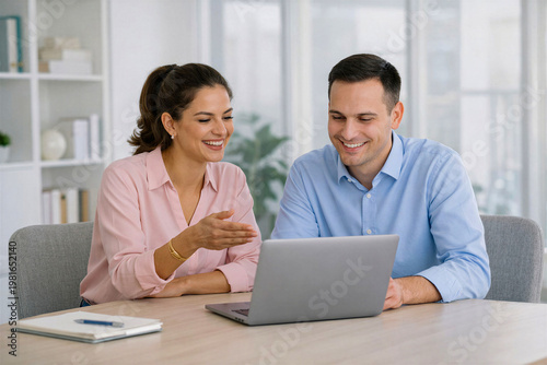 business people working together on laptop