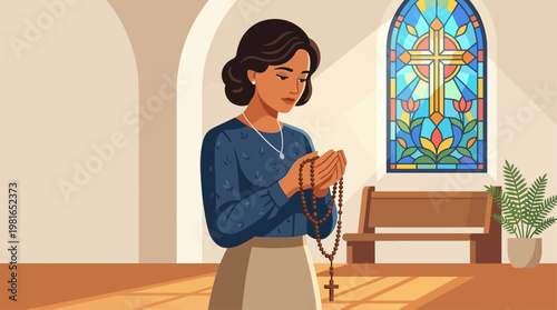 Woman prays on National Day of Prayer in church with stained glass.