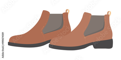A pair of brown ankle boots with pull tabs isolated on black