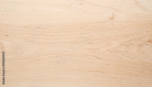 Bild auf Leinwand Close-up view of a smooth, light-colored wooden surface showcasing natural wood grain patterns, perfect for backgrounds and textures in design