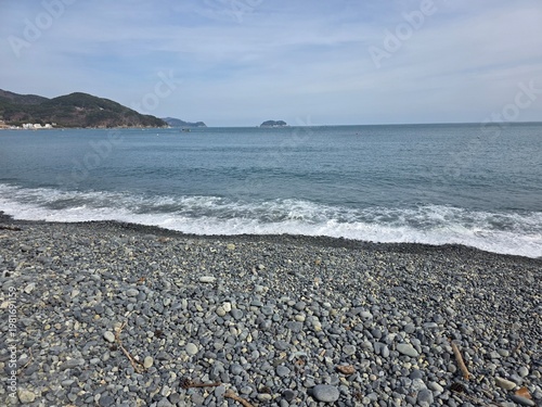 Geoje Mongdol Beach is covered not with sand, but with smooth, rounded black pebbles.