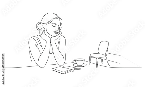 Young woman resting her chin on her hands with a book and coffee