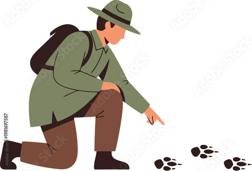 Man looking at animal foot prints.