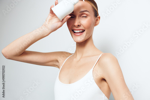 Woman drinking milk, smiling young portrait, healthy wellness nutrition and dairy concept, fresh white background, closeup beauty care, natural skin and hydration