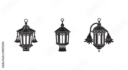 Black and white lanterns with tassels hanging from the sides  traditional middle eastern lighting fixtures  decorative objects  isolated on white background