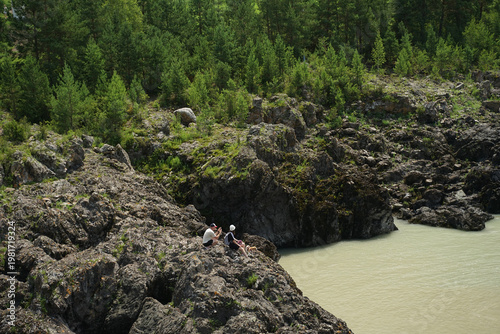 Picturesque coastal landscape with large rock formations and greenery