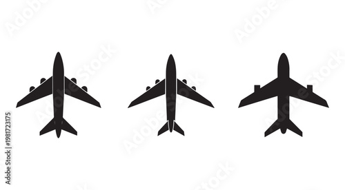 Three black silhouettes of airplanes in different positions from above  airliners in flight  commercial jets  aircraft views
