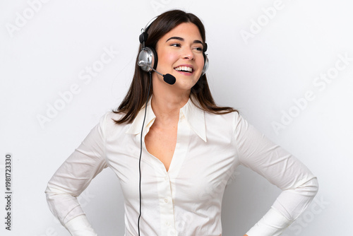 Schilderij op canvas Telemarketer caucasian woman working with a headset isolated on white background