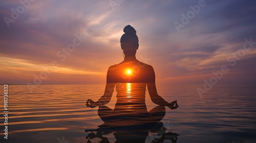 A Serene Silhouette Meditating During A Radiant Golden Ocean Sunset.