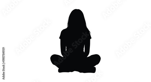 A woman meditating in a cross legged pose depicted as a dark silhouette