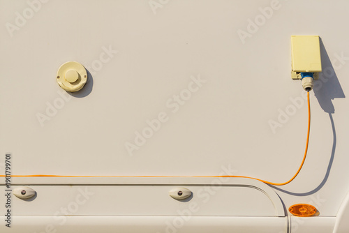 Details of camper vehicle, power socket with cord plug