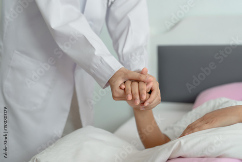 Close up of professional holding patient hand.  Empathy, mental health, support and consolation