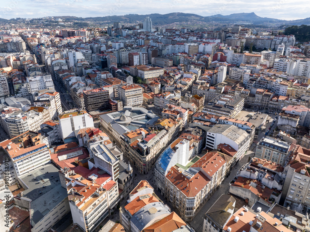 Obraz premium Aerial view of Vigo city center in Pontevedra, Galicia, Spain. Coastal city on the Ria de Vigo inlet, Capital Comarca.