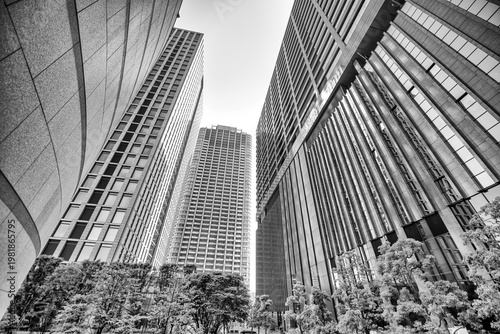 High-angle view of Tokyo’s Shimbashi Shiodome district, highlighting contemporary towers, streets, and urban environment