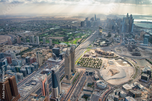 Wallpaper Mural Drone-style aerial view of Dubai cityscape from helicopter in United Arab Emirates Torontodigital.ca