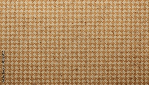 A classic and timeless houndstooth pattern featuring small geometric shapes in warm beige and brown tones, creating a textured fabric background.