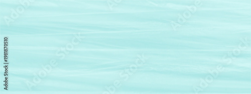 Turquoise waves of transparent stretched cellophane. A stretched wrinkled plastic film texture with dotted halftone effect. Crinkled oilcloth background with soft folds and material look for package.