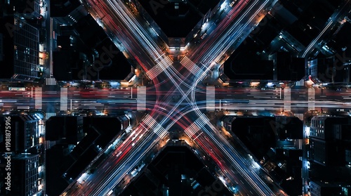 Abstract view of highway traffic at night with light trails abstract transportation movement infrastructure cityscape crossroads midnight