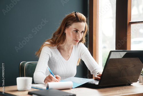 Woman Working with Laptop and Coffee Remote Work Productivity Scene