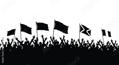 Silhouette of a large crowd of cheering people holding flags during a festive public protest or rally