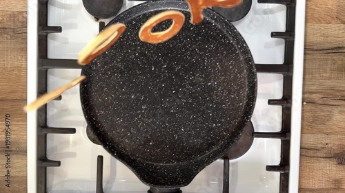 Pancake Letters Forming Word Cook in Reverse Motion on Frying Pan, Creative Food Concept