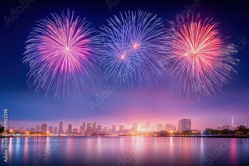 Fireworks over city night sky