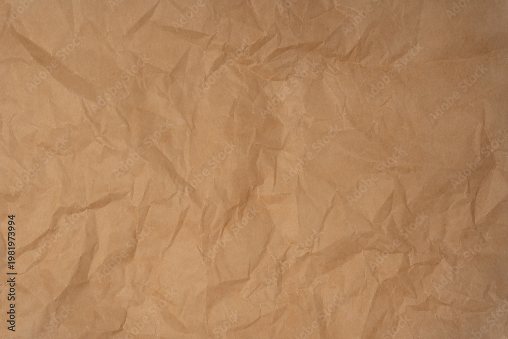 Fototapeta premium Crumpled paper as background. Top view.