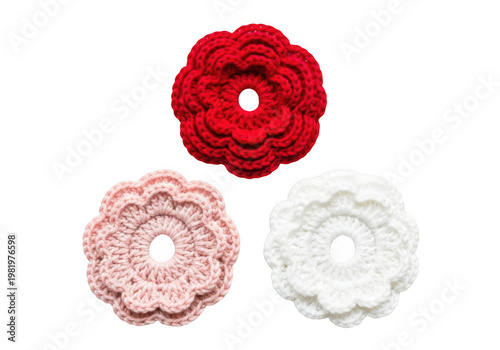 Three intricately crocheted flower designs in red, pink, and white isolated on transparent background