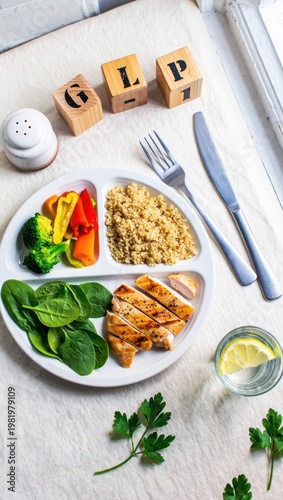 Balanced meal plate with grilled chicken, brown rice and vegetables near GLP-1 wooden blocks, healthy nutrition for weight management, metabolic diet plan, protein-rich lunch for satiety, medical food
