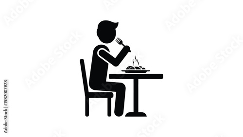 A person sitting at a table eating.