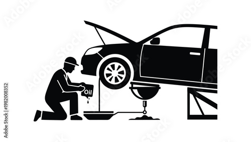 Mechanic changing car oil.